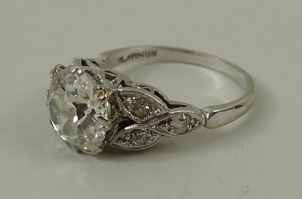 A platinum and diamond solitaire ring, the central old cut diamond approximately 1. - Image 2 of 3