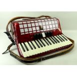 An Art Deco style Parrot piano accordion, cased.