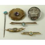 A Victorian amethyst and agate brooch with pinchbeck mount,