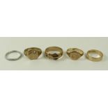 A collection of rings comprising a 9ct gold band, size O, signet ring, size S, further signet ring,