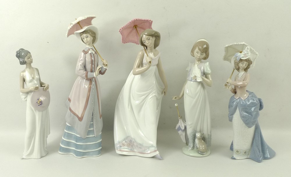 A group of Lladro figurines, comprising Parisian Lady, 5321, 27cm, Afternoon Promenade, 7636, 26.