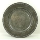 An 18th century pewter charger, 46cm diameter.