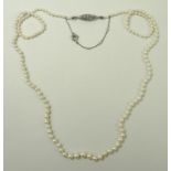 An Edwardian Art Deco cultured pearl necklace, strung with graduating pearls, 1mm to 4mm,