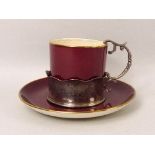 A Crown Devon Fielding's part coffee set, in maroon ground, the cups in silver holders,