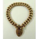A 9ct gold link bracelet with pad lock clasp and safety chain, 20.2g.