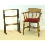 A Victorian elm smoker's bow chair, 64 by 30 by 80cm high, together with a mahogany towel rail,