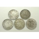 A group of five Chinese silver and white metal trade dollars, late 19th and early 20th century,