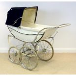 A vintage Royale coach built pram, white with blue livery, with canopy and accessories,