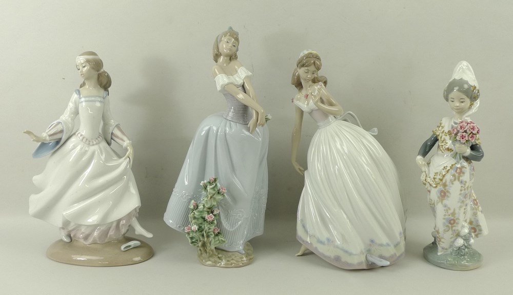 A group of Lladro figurines, comprising The Glass Slipper, 5957, 26cm, Cinderella, 4828, 25cm,
