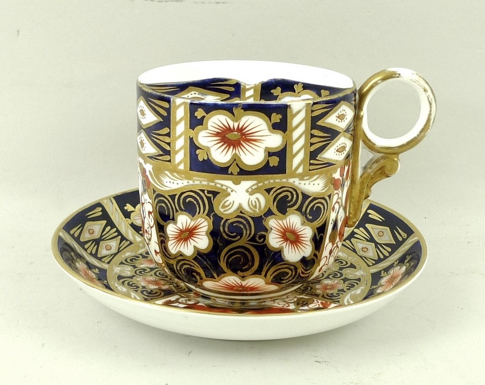 A Royal Crown Derby Imari pattern moustache cup and saucer, both marked to base 2451,