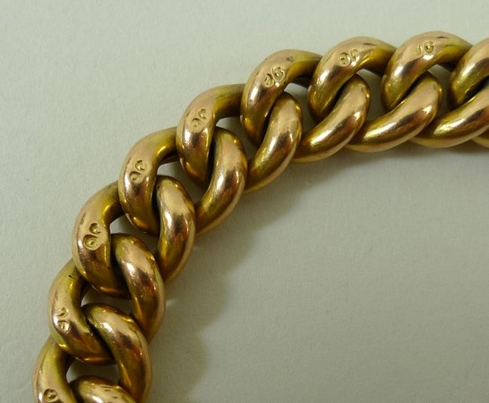 A 9ct gold link bracelet with pad lock clasp and safety chain, 20.2g. - Image 3 of 4