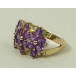 A 14ct gold, diamond, amethyst and peridot dress ring, makers mark 'IW', size Q, 5.9g.