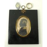 An early 19th century silhouette portrait miniature of a gentleman, a 9ct gold ring, size W, 3.