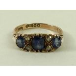 An Edwardian 9ct gold, sapphire and diamond ring,