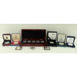 A collection of silver proof coins,