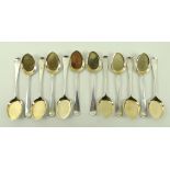 A set of twelve Victorian silver ice-cream spoons, Old English pattern, with silver gilt bowls,