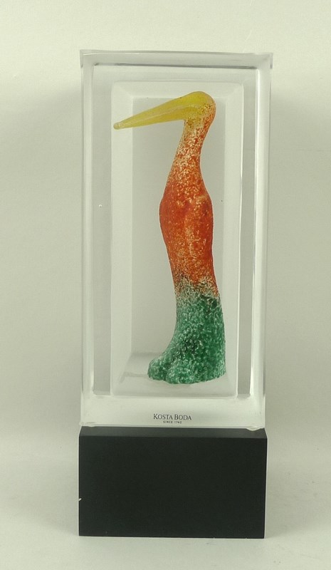 A Kosta Boda Scandinavian Art Glass sculpture of a colourful bird, designed by Kjell Engman,