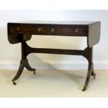 A Regency mahogany and crossbanded sofa table,