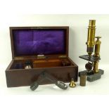 A Millikin and Lawley brass microscope, with fitted mahogany case, label marked Millikin and Lawley,