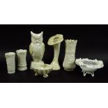 A collection of Belleek ceramics comprising six pieces with pearlised yellow glaze to include owl