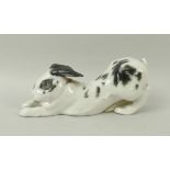 A Meissen rabbit in stretching pose with outstretched front legs, late 19th century,