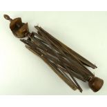 A Victorian turned beechwood wool spinner or yarn winder, with turned cup end and clamp attachment,