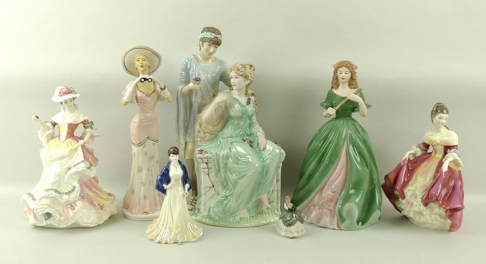 A collection of Royal Doulton figurines, comprising 'Flowers of Love' HN3709, 'Rose',