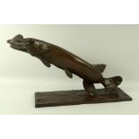 A patinated bronze sculpture of a pike with prey, early 20th century, naturalistically modelled,