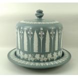 A blue-grey jasperware cheese dish and cover, mid 19th century, unmarked, of domed form,