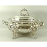 A Regency silver plated tureen and cover, of oval form with twin foliate cast handles,