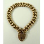 A 9ct gold link bracelet with pad lock clasp and safety chain, 20.2g total weight.