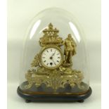 A French gilt spelter figural mantel clock modelled as Shakespeare in his library,