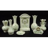 A collection of Belleek ceramics in Shamrock pattern comprising Glenveigh mantel clock, 25cm,