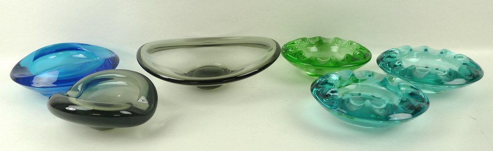 A collection of glass bowls and ashtrays, comprising Per Lutken Selandia smoked glass fruit dish,