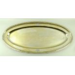 A French late 18th / early 19th century silver gilt serving dish, of oval form with stepped rim,