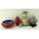 A cinnabar lacquer bowl with a blue enamel interior, 15 by 6cm, a cinnabar vase, 11cm,