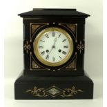 A Victorian black slate mantel clock, circa 1860, the two-train movement striking on a bell,