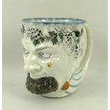 A Staffordshire creamware pottery mug, late 18th century,