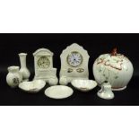 A collection of Belleek ceramics comprising Donegal clock, 23cm, vine clock, 20cm,