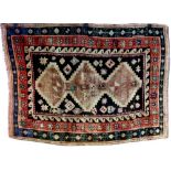 A Shiraz rug with black ground,