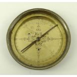 A brass compass, 18th century, Gregory and Wright, London, engraved with floral motifs,