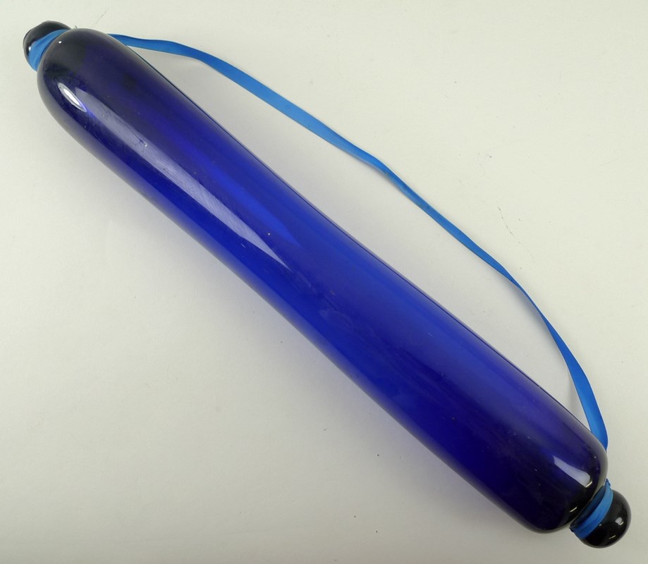 A Bristol Blue glass rolling pin, 43cm long.