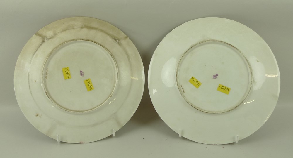 A pair of Royal Worcester porcelain plates, late 19th century, painted with floral central reserves, - Image 2 of 2