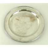 A George III silver plate, of circular form with reeded borders, armorial crested, London 1793,