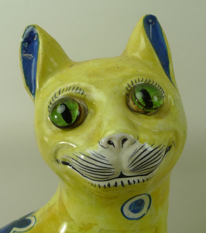 An Emile Galle yellow faience model of a seated cat, late 19th century, - Image 6 of 7