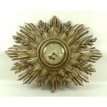 A sun burst wall clock, early 20th century,