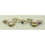 A 15ct gold, jet and diamond ring, the central oval cut stone, surrounded by diamonds, size O,