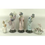 A collection of Lladro figurines, comprising three Geisha girls, 29cm, a girl with oranges, 16cm,