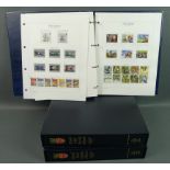 Two stamp albums including 180 Millennium Great Britain sets from January 12 1999 to 2009,