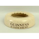 A ceramic advertising ashtray for Guinness, early 20th century,